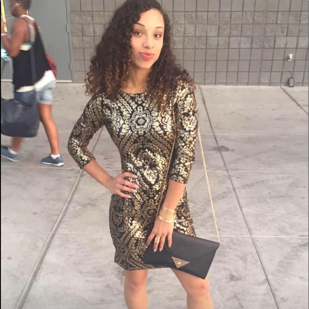 Black and gold sequin dress
